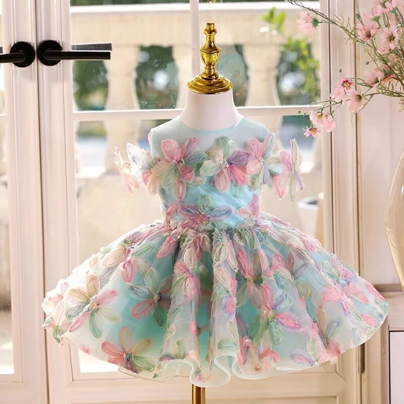 Elegant light blue child's dress adorned with colorful