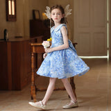 Elegant Back View of Girl in Floral Dress and Winged Accessory